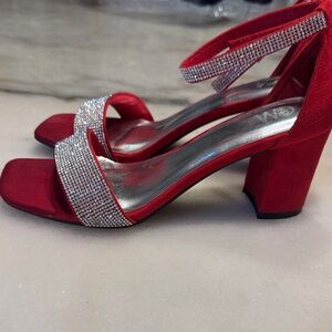 Elegant Red Heeled Sandler with ankle strap